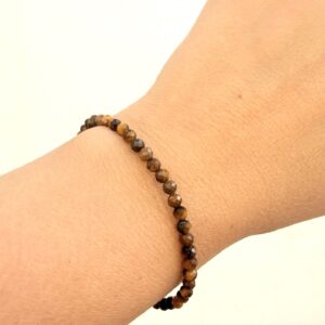 Pulsera Ojo de Tigre Facetado y Acero.
Protección, Fuerza y confianza